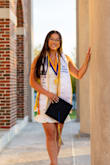 I wore this for my high school graduation in 2021 and wore it again for some of my grad pics for college in spring 2025.  Love the length and the ruffle at the bottom. Stretchy fabric allowed me to still fit into it 4 years later lol. No complaints! - Emma G.