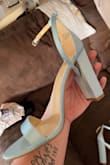 The baby blue color is beautiful and matching perfectly for my daughter's dresses for my wedding. They're not very comfortable at all but what heel really is lol. They fit true to size. The ankle strap barely fit my ankle though, like thank goodness it's stretchy? - Kaytee D.