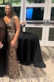 I fell in love with this dress as soon as I saw it.  Although the recommendation was a medium, I actually fit best in a size small.  I was looking for an extremely fitted gown.  The small was fitted but not so tight that I couldn't move in it.  I wore this to a gala and received so many compliments on it.  I absolutely love this dress! - Christina S.