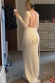 When purchasing, I checked out many reviews before deciding. The dress is nice and snug. I will be wearing some undergarments for my stomach. In these pictures, I don't have any on. I also don't have a bra on in the photos either. The sleeve is comfortable, but you can still feel the beading. It's not enough personally for me to be uncomfortable with the beads. The top fits nice, and the back has a nice swoop down on the lower back. The inside of the dress is nice and soft. I would recommend to other brides or anyone looking for a white dress.  My sizing: 32D, size 28 pants, size small in shirts. I weigh about 140. I am 5'4 - Liv H.