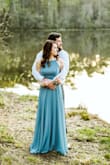 I bought this dress for my engagement pictures because I wanted something long and flowy and it did not disappoint! I ordered the small and medium, and the small worked best. I wore 3.5 inch heels and adjusted the straps quite a bit to avoid hemming the dress. The fabric and movement of this dress are perfection. Loved it for my pictures! - Jessica N.