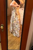 I am a firm believer in reading reviews but never writing them, but this dress deserves its flowers (both figuratively and literally). I had initially tried the medium, which wouldn't zip up over my chest, but the large fits like a glove. Waist snatched. Feel like I'll be the belle of the ball. love. - Tamara B.