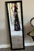 Love this dress, it is fitted through the middle, but is loose through the bust (I'm very small chested). It looks exactly like the pictures. Can't wait to wear it. - Karen L.