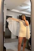 I wanted to love this. The fabric is not good. It's a very cheap body con dress with a cape attached. - Rebecca E.