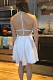 This dress is so cute! It is longer than I was expecting but that's actually okay. I usually struggle with the bust in backless dresses but I was able to wear it without a bra! I'll get some stickies just to be modest since I'm going to wear it to my bridal shower and wedding shower. - Laura B.
