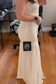 I got this for my rehearsal dinner for my August wedding! I'm in between medium and small sizes. Iwent with the small and glad I did! It's not too heavy and breathable. - Haylee B.