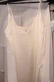 I needed a slip dress to go with this cape I bought, and I found this one on sale and thought it was perfect. It is more yellow ivory than other dresses I've tried, but it still looks great with the cape. It fits me great and is not see-through. - Mallorie W.