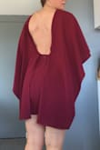This dress was the potential to be a WOW! But it was pretty short on me and and front was just too much for my body. I think this dress would be better on someone who is not very petite...it's a lot on top. - Tiffany G.