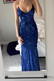 Very flattering and fits perfectly. I ordered xs, and I was going to get xxs, but the xs is perfect. It's a little long, but I'm short, so I figured. Material is nice too! - Lily O.