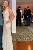 Great stretchy material. Good quality. Fit true to size. I wore spanx underneath just to make myself feel more comfortable in it. I got so many compliments! - Caitlin B.