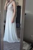 I really wanted to love this dress because the bottom is really flowy and flattering, and has a really soft lining. But the top is... crazy. If the entire bodice was solid white fabric, it would be a game changer. Unfortunately, it is sheer right above and below the bust, but there are two white cups that draw awkward attention to your boobs. I'm smaller chested, and yet the cups were still sewn way too high up. Like 1.5 inches of my breasts showed under the cup where the sheer fabric is.
It's also somehow too small and too large. The straps are too long yet the bodice is quite form fitting. To make it wearable, I'd need to spend twice as much money on alterations than I paid for the dress itself. So much potential but unfortunately a bust! - Kelly J.