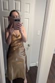 The fabric is thick, unforgiving and not flattering. It stands awkwardly on the chest area. I will never wear this dress and unfortunately I bought it on sale. What a waste of money. - Tamar I.