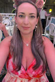 This dress is beautiful, and the pink color is stunning. Originally, I ordered in purple, medium, and I couldn't zip it up. It was way too tight. I then ordered the large in pink (kept the medium as I'm in the process of losing weight), and the pink was even more stunning. I wore it on a cruise. Only bad things were: the straps are super thin and didn't feel the most secure, and since I had to size up, I later realized my bra peeked out during the course of the evening. Unfortunately, I didn't get any full length photos. - Kristen P.
