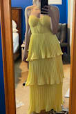 I love it, but I don't know how to fix the material under the armpit. It kinda sticks out a little weirdly. I will take it to a tailor and see what they can do because seriously, the rest of the dress is soooooo pretty. I love how flowy it is and perfect for a summer formal wedding. Maybe I'll just keep my arms down lol - Rachel F.