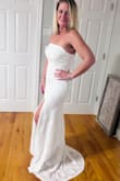 I wanted to wait until after my wedding day to write a review, but I can write another one. Ordered this dress as I saw the vision of what I wanted. The dress is so light, comfortable and stretchy that it fits all the right ways. I removed the sleeves as it wasn't the look I wanted. I'm doing a beach wedding in Mexico and wanted simple, and everything was too over the top; this was what I wanted. I'm having it altered in the back to make it my dream dress (corset tie back) and having it hemmed about 2 inches, as I'll be barefoot and no heels. I will write another review after I have my final version. P.S. I ordered the same dress again as a backup in case anything happens with alterations, as I will wear it as is without the sleeves - Christina V.