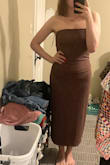 Material and fit are great. The bust area is a tad too big on me, but it doesn't slide down. I have a small chest, so it's to be expected. It's lined, stretchy, and comfortable. I ordered a medium and it fits true to size. You could size down for a more snatched fit. - Karly M.