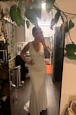 Love this dress. The quality is great. It's heavy & comfortable. The only issue I have is that I have broad shoulders and the arm holes/sleeves are not adjustable so it's tight and the neckline sits higher than I'd like. It's also not as tight as I'd like but I think I'm going to have it tailored. - Bella B.