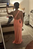 Obsessed. This is my signature color, and it truly pops. I have curves, but since I'm small, they get lost in a lot of more structured or flowy dresses. This hugs and creates such pretty body lines. Super comfy and feels like butter! - Laura K.