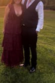 I wore this dress for to match my husband (without being too matchy) for a wedding he was in. Wedding forecast was 50 and rain. I stayed warm and was complimented all night long! The V is very deep but the layers nicely covered my 13 week baby belly! - Johanna S.