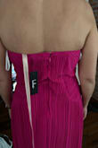 I loved the color of this dress and was really hoping it would work, but it didn't. The quality of the fabric was exactly as pictured and the style is great. The issue was what others had said - the bunching. For me the bunching was under the chest area and the zipper in the back. The zipper did not sit straight and there was this weird fabric under the bust. - Bahareh H.
