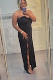 I was unsure what size to get, but I trusted the sizing chart. The dress arrived and was a little too loose on the sides and a bit by my bust. I had to get it taken in a bit. After that, it fit great and made me feel really pretty. I'm also tall, 5'10, the length was perfect even with 4-inch heels. I wouldn't size down. I would just get it altered. - Cristen D.