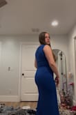 The fabric is great quality nice and thick! The fit of it is stretchy and compressing. The blue color could be a little bit brighter. The asymmetrical straps are really fun. I can wear a bra with it, which is great. I would recommend wear shapewear or a slip with it, however, because the fabric doesn't show a lot. - Colette G.