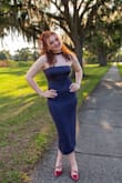 This dress fits perfectly with one small exception. The top strap was loose, causing it to be loose and hang down in the back along the strap.  We took the dress in for minimal alterations, but overall, it was a great dress. Lots of compliments and very comfortable for a night full of dancing. - Nanette S.