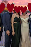 I loved this dress. It fit well and had a fun, heavy skirt for dancing. Even after a night of open bars and running around with the newlyweds, the dress held it together, and I looked fantastic all night. Tons of compliments. - Jillian G.