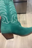 These are not the same color as the picture?? The reason I bought them was for the beautiful pale green. It honestly looks like the top of the foot was a different patch of material bc it's a different color than the rest. - Natalie L.