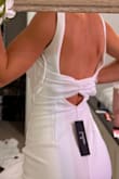 I got this for my graduation, it is the perfect balance of professional from the front and hot from the back. Super cute! Not see through at all, stretchy, great material! - Lily F.