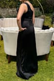 Wore this dress as a wedding guest and honestly? It was the best decision I made. The fit was spot on, maybe just a tiny bit loose around the chest, but nothing a fashion tape can't fix and definitely not a dealbreaker.
The real star here is the fabric. It's light enough that you won't feel like you're melting on the dance floor, but it still looks super polished and put-together. And stretchy?? I literally danced ALL night and never once felt restricted. No awkward tugging or adjusting, just vibes.
Black dress, wedding guest, 10/10 would absolutely recommend. - Paulina M.