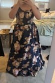 I ordered an XL, and the chest is very large. I have a smaller chest, so I would keep that in mind. Also, the straps were awkwardly placed outward. They pointed literally away from me, making them impossible to keep up. I'm talking, they literally started at my armpits. 

Aside from that, the quality and print was very nice and just like the photos. It had some structure in the top, but not enough that you could go without a bra. I'm also 5'3, and it would need tailored, but I'm used to that. 

I opted to size down, and I hope that will fix the chest issue. I'll update my review if it fixes these issues. - Deby S.