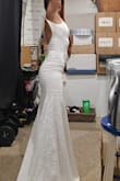 I am in love with this dress. Super skeptical about purchasing my wedding dress online, but I'm so happy I took the chance. True to size and absolutely beautiful. Hugs all the right areas. It is not forgiving, so if you want that snatched look even more than this dress already gives you, get some sort of body shaper. I cannot wait to wear this on my wedding day. Pictures were taken when I first tried it on. - Mila D.