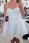 Unfortunately, the quality of this dress did not meet my expectations. The material is definitely not great and looks and feels very cheap. Even with the lining, the dress was still a bit see through as well. - Alexandra V.