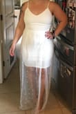 I ordered a medium and it fit perfectly. I thought it was going to be long but with heels it will work out perfectly. The fabric is very soft and the lace has beautiful little pearls on them. Cant wait to wear this at my bridal shower. All it needs is a cute little belt! - Ashley F.