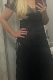 I got a medium bc I am probably a true s-m and I saw that this dress runs small. It fit perfectly! I love the feel and length is fine even though I am typically too short for everything. I wish the sleeves were different. Maybe longer or "puffed" or even just wider. They felt a little tight, and I already have what my husband calls "mom arms". I still gave it 5 stars even though I am returning it because I think it's beautiful on everyone but me. - Susie M.