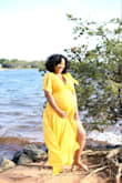 I wore this dress for my Maternity Photoshoot and absolutely loved it! How it wraps around was a blessing! It was comfortable to wear, it was light! The only issue I had was the slip underneath, it was a bit short but at least it covered my butt! ;-) - Tyffani N.