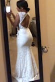 This dress is as pictured! A little snug around my waist line but its do-able. I will be wearing this dress my reception dress. I wanted something light weight. Since I'm so short it is a little long even with heels on but its similar to how sundress fit for me. A must buy! - Dawn B.