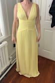 Had to add a review with photos! Fits nicely and flattering neckline (not too low for a wedding), and the side view and back are very interesting and unique with Greek goddess-esque vibes. I am 5'7" and could use a tiny bit of a hem (in photos, I am barefoot), but instead will probably buy heels with a bit of a platform. Needs lil "cakes" or pad inserts for bust, but that is easy! Excited to wear this in a wedding after it's been steamed and accessorized! - Melissa K.