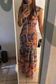 Looks and drapes exactly as the picture. True to size. Vibrant colors, very eye catching. Good movement whilst walking, very comfortable. Worn all night and through a big dinner and felt comfortable. Much to my disbelief, I wasn't dying to get home and change out of my clothes by the end of the night. - Raquel D.
