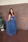 This dress is absolutely dreamy! It's even more stunning in person, and I got compliments all night on it. Fit-wise, I don't totally know what size I need after having two kids, but I think I'm between a M and L. The L was a bit big in the waist and bust, but I think a M would have been too tight as the waist has no stretch. It's also really nice to have the back that ties, plus adjustable straps, so I could customize the fit a bit better. - Kirsten L.