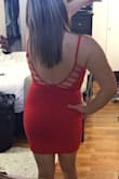 The material is nice and think you can't see through it at all. Straps are always so long on me because I am short so when I tighten them the clasp ends up being in the front, but I don't mind too much. The red is nice and bright! A little bit big in the bust area but not bad. - Jacquelyn K.