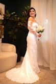I did need to make a few adjustments to the dress, but it was completely worth it. I felt like the most beautiful bride on my civil wedding day. The quality is divine, and every detail is simply exquisite. I couldn't have chosen a more perfect dress. - Stefanie G.