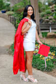 The fit was perfect and true to size. The only thing I don't LOVE about the dress is the bow on the back definitely does not tie well enough to sit like it does on the model. Other than that, it's perfect. - Amber H.