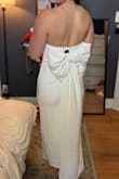 Fits true to size. Love that it has the sticky rubber at the top to help keep it up. The bow in the back is detachable and is such a cute touch! - Emma Y.