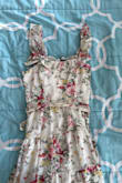 I loved this dress when I got it! I ordered a small even though my measurements said I'd be a medium and it fit perfectly. I wore it to my wedding shower the next day and it was perfect, until the elastic within the strap broke about four hours into the first wear. The whole strap has lost its shape and fit and it's not something I can fix myself because it's inside the strap, so I'll have to take it to a tailor and spend extra money on it after only one wear. Could be that my dress was the only one not made well, or the dress might just be cheaply made. I really liked it but am disappointed. - Alexandra M.