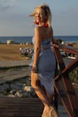 I ordered this to wear in Havana Cuba and it turned out even more perfect than I'd hoped! My boobs are a little squished into the top so I can't wear a bra but it works nonetheless and the skirt fits perfectly. The whole look is super flattering even on a petite gal! - Ashley A.