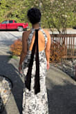This dress was everything I hoped for. Comfortable because of the stretch, sexy with the high slit and low back, flattering with the halter neck line and ruching, and stunning with the white/black floral design and velvet. I received SO many compliments on the dress and how amazing I looked in it. At my height, it required no hemming, I just grabbed a slightly higher heel than I already owned to ensure it wouldn't drag. I was sitting for hours at my event and was never uncomfortable. - Gillian L.