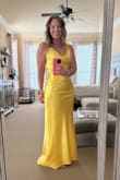 I have wanted this dress, or some version of it, for years! Yellow is my favorite color and this dress has always been on my radar. This spring I attended a gala for my school district, so I FINALLY had a good reason to buy it! Considering that I got it on sale and it was $77 with taxes, I think I got a great deal and I am so excited to wear it again!!! I will say it fit better once I steamed it and let it hang up a few days. I got so many compliments at the Gala and several people recognized it as the Andie Anderson dress from How to Lose a Guy in 10 Days! - Nancy J.