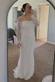 I sized up to XL due to other reviews saying sleeves were tight. It was also a bit too long in the front, but I was able to get it altered, and it fits like a glove. Second pic was before alterations. - Evelin V.